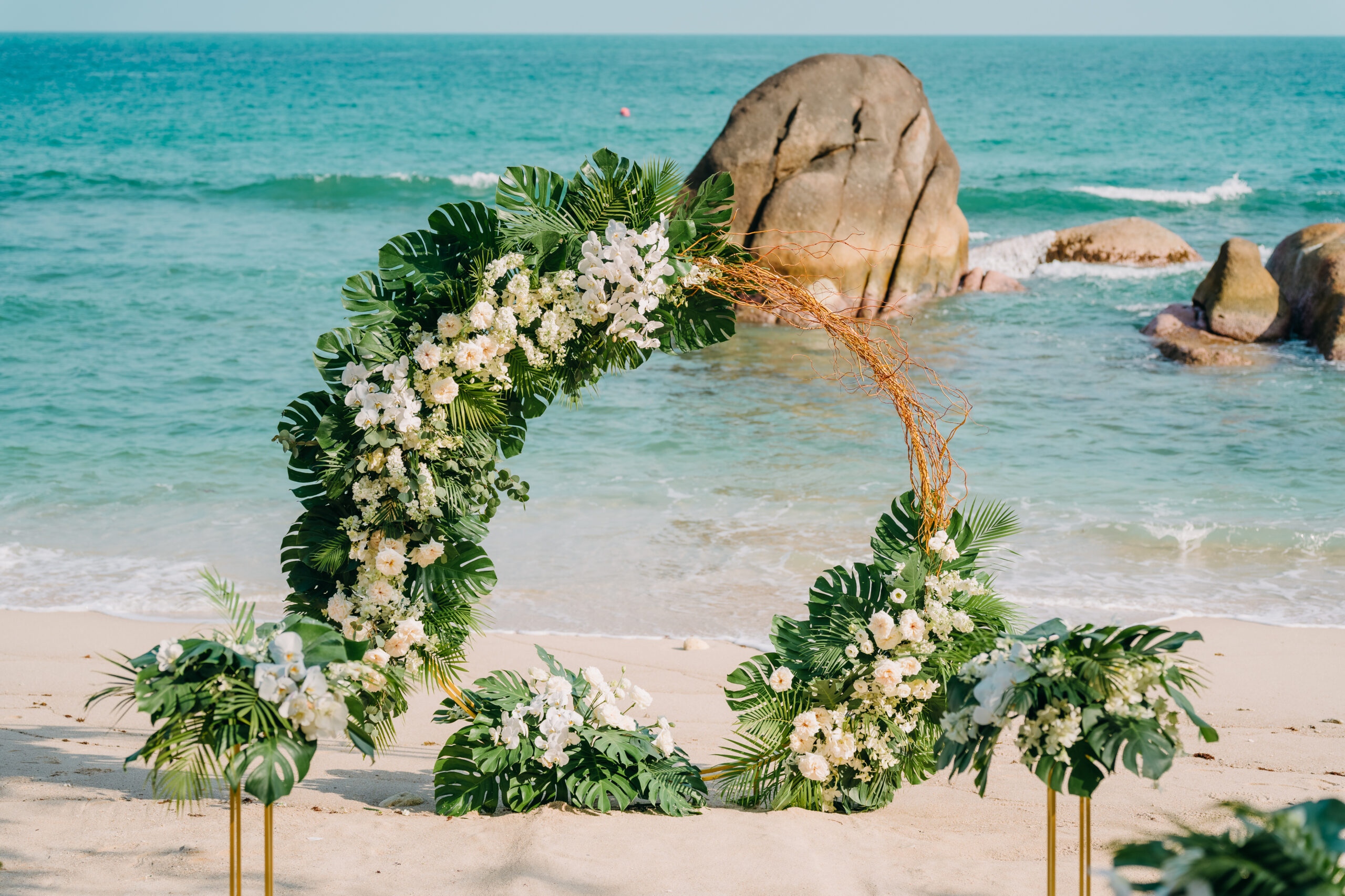 floral wedding arch setup on Silavadee Koh Samui private beach