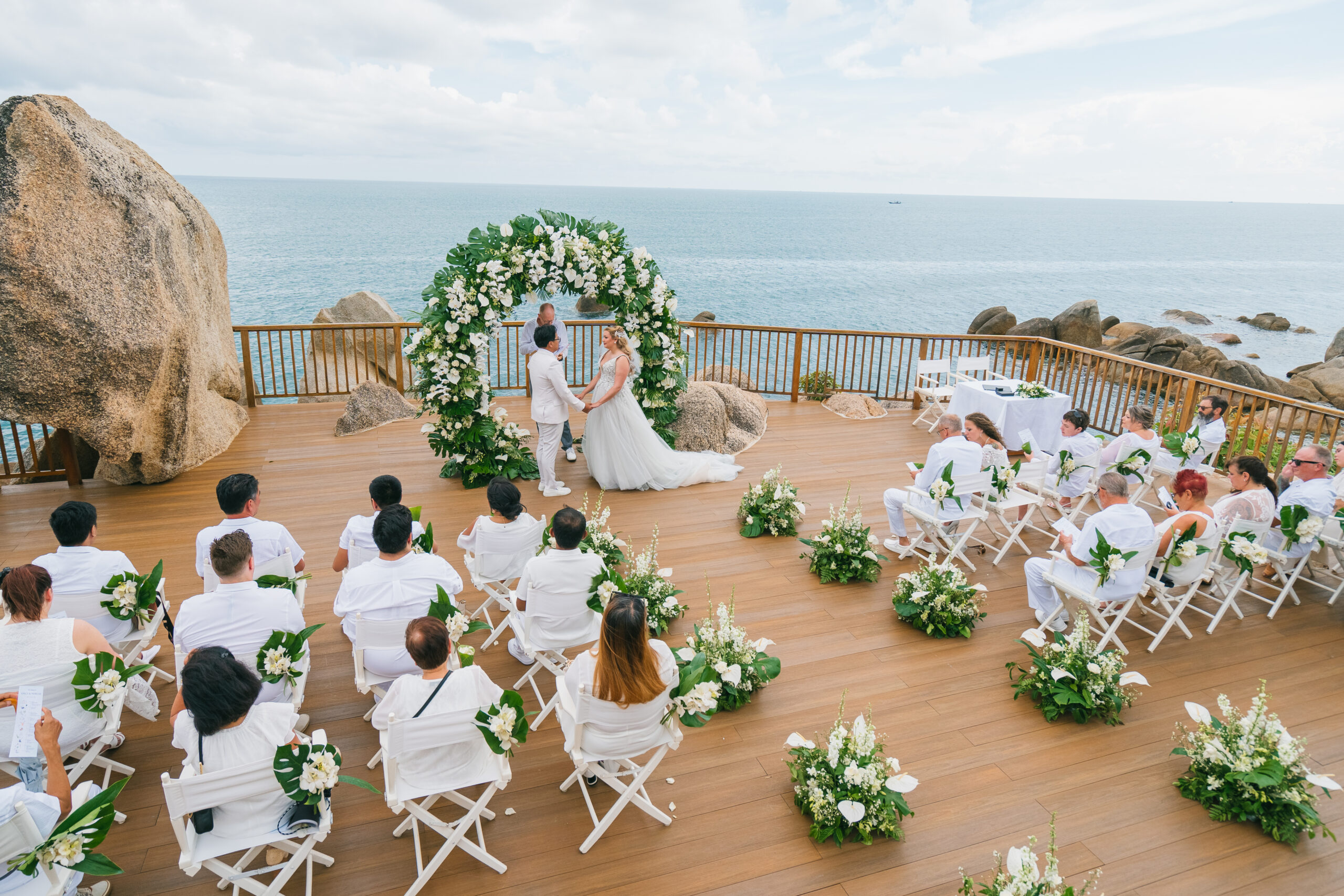couple exchanging vows on clifftop at Silavadee Koh Samui